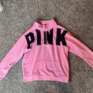 Pink! Pull over half zip, size medium, ok condition (picture shows imperfection)